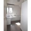 badkamer met ligbad en inloopdouche en badmeubel